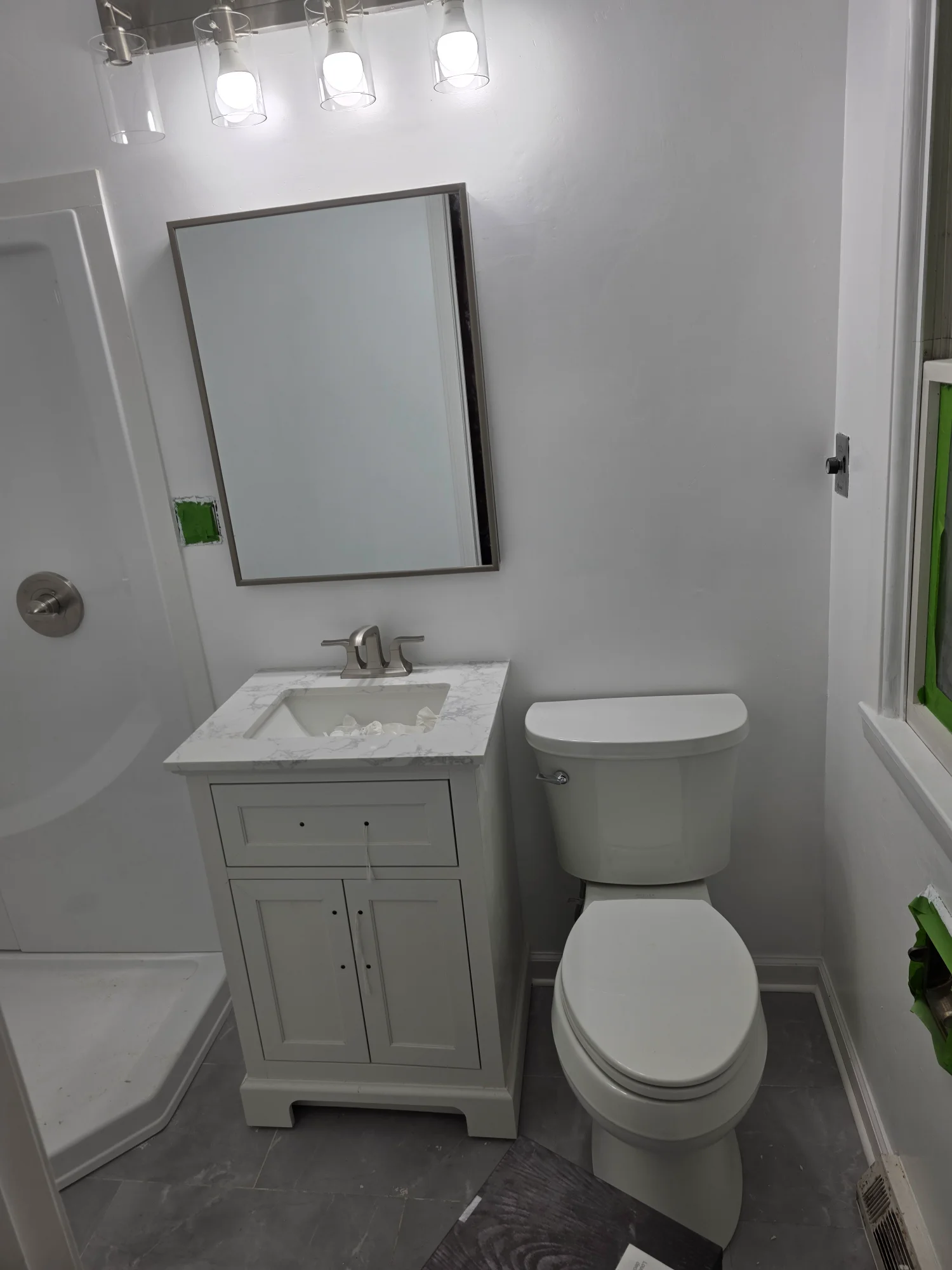 Bathroom after remodel - new vanity and toilet
